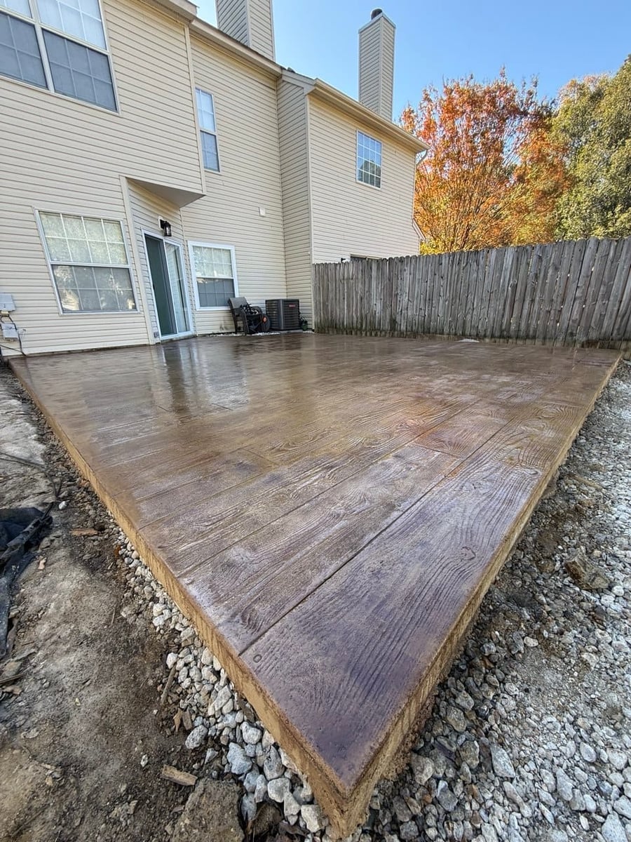 Backyard stamped concrete patio with wood-plank pattern — Hampton Roads, VA